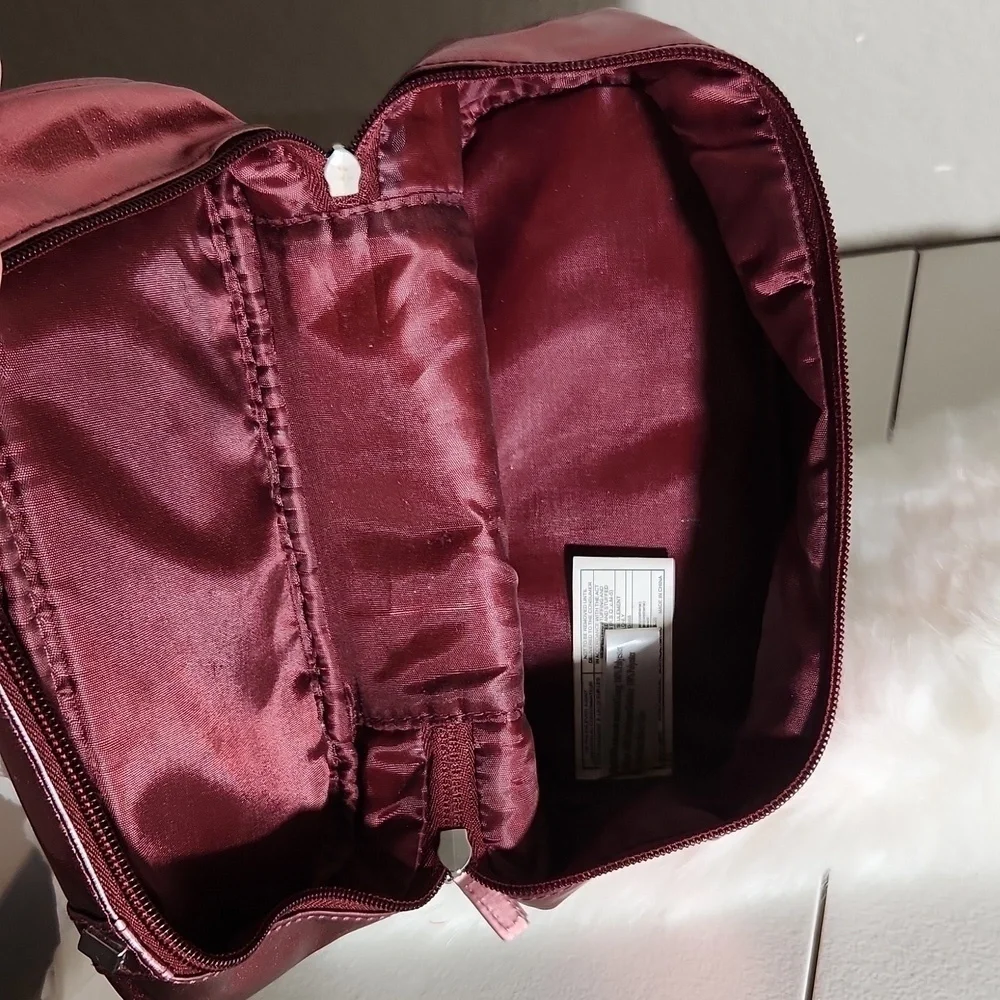 Avon Metallic redish pink makeup bag